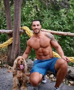 Michalis Evriviades outdoors with his dog Sandy